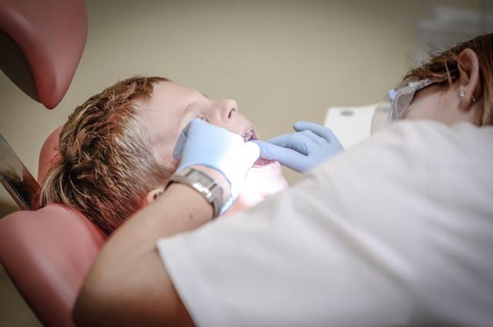 A boy at a dental checkup