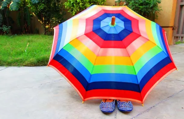 umbrella with little feet sticking out