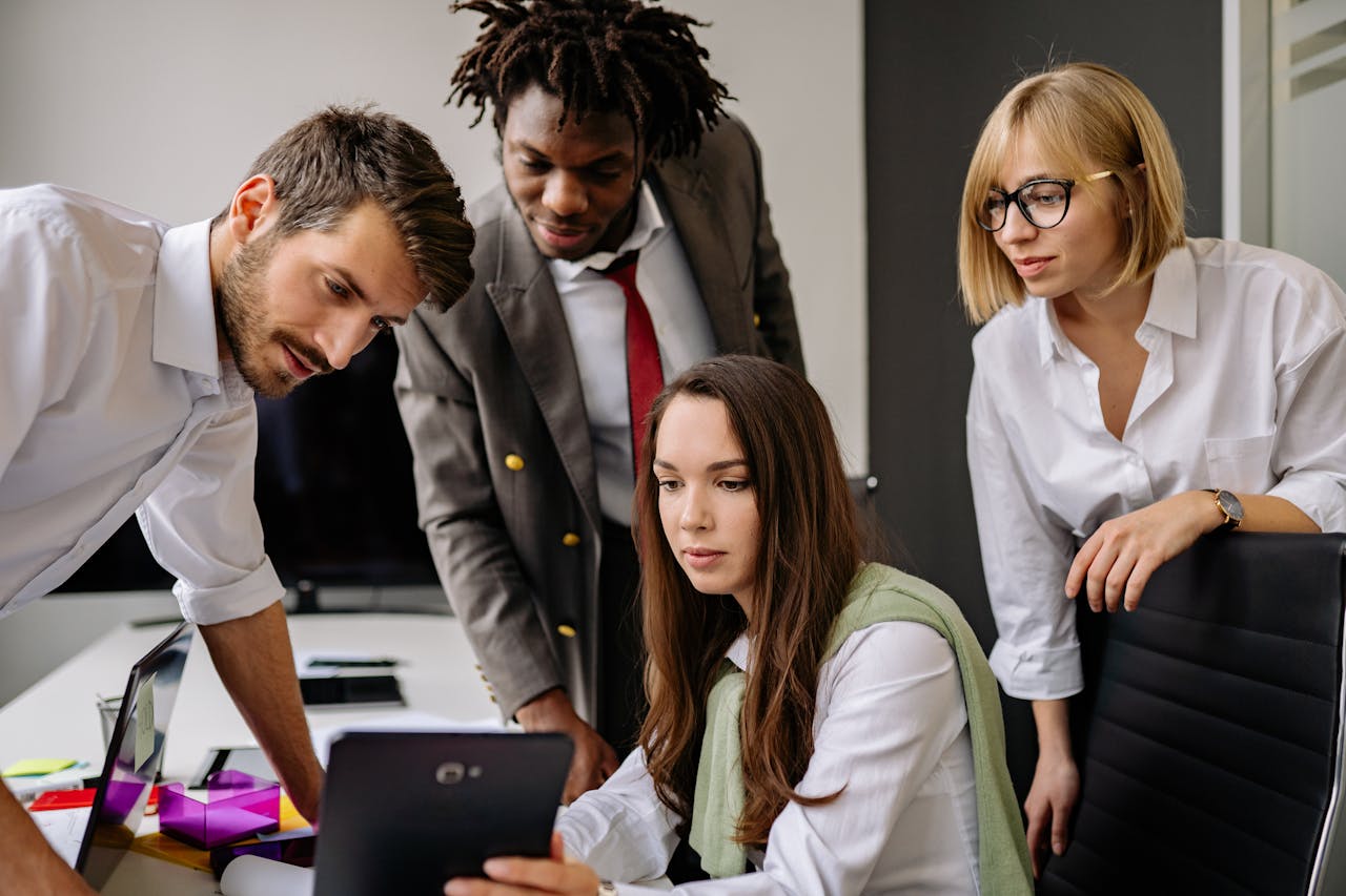 Small business team reviewing benefits